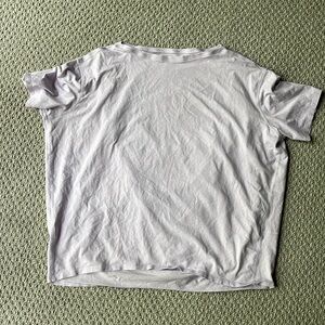 lilac lululemon sz 8 back in action short sleeve. good used condition!